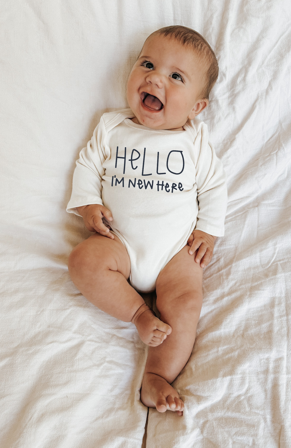 "Hello, I'm New Here" Organic Baby Bodysuit