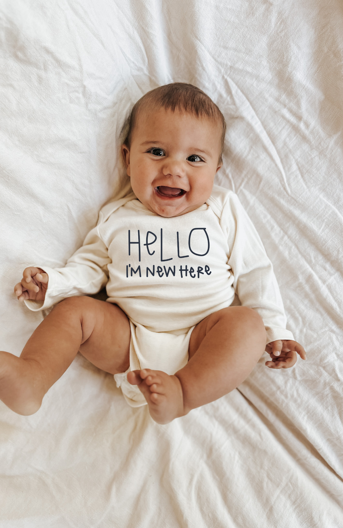 "Hello, I'm New Here" Organic Baby Bodysuit